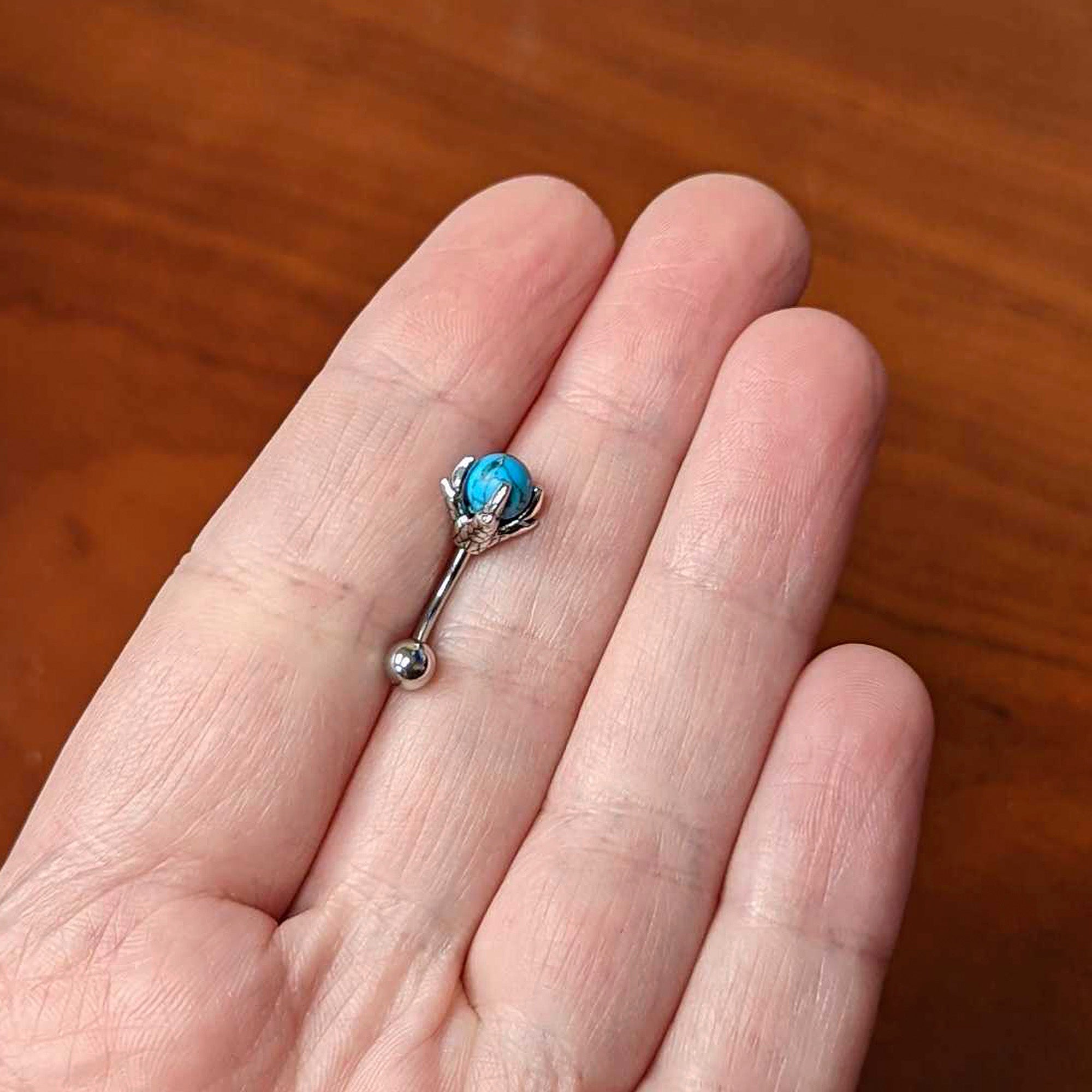 16G 5/16 Blue Turquoise Skeleton Hand Curved Eyebrow Ring