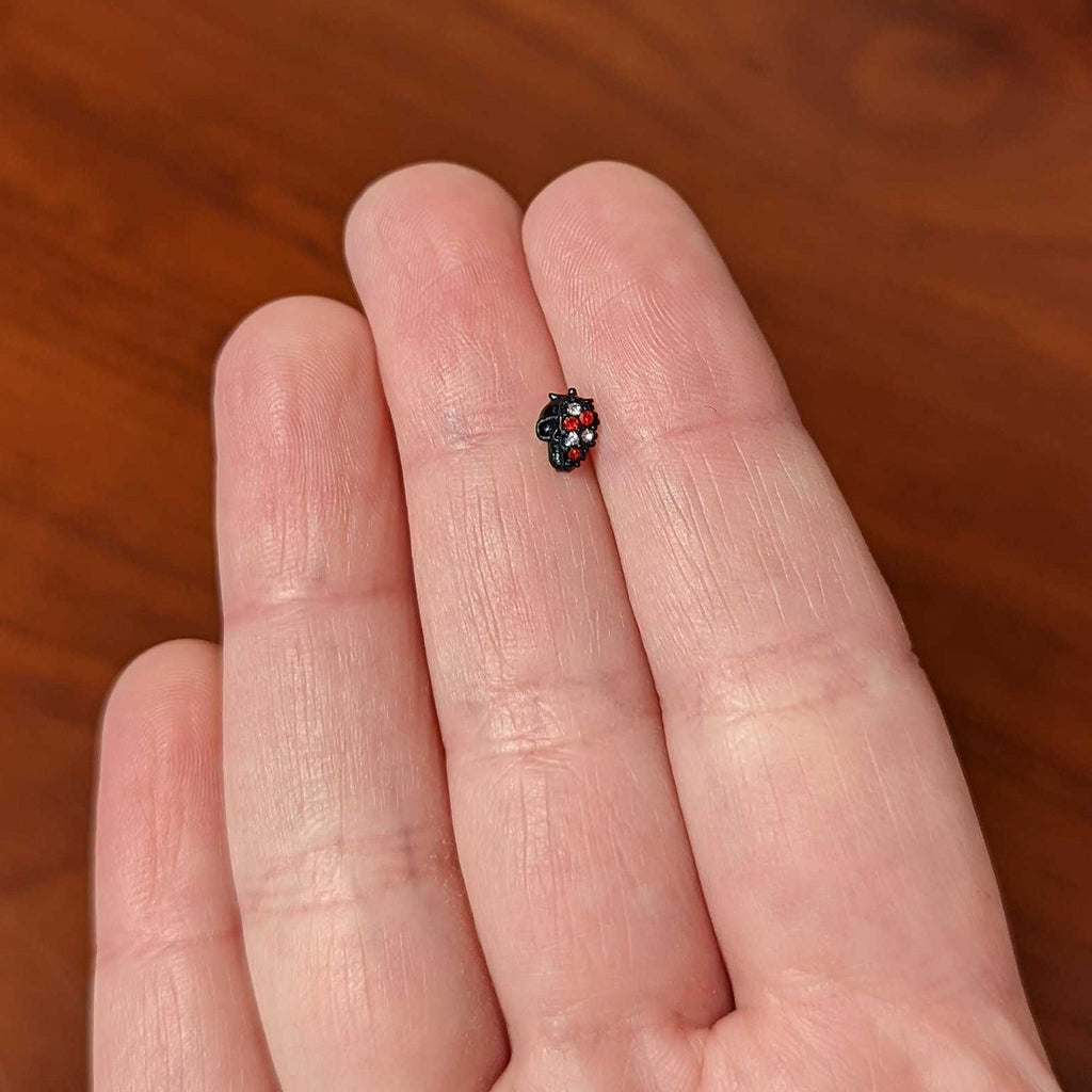 20G 1/4 Clear Red Gem Black Skull Halloween Nose Bone