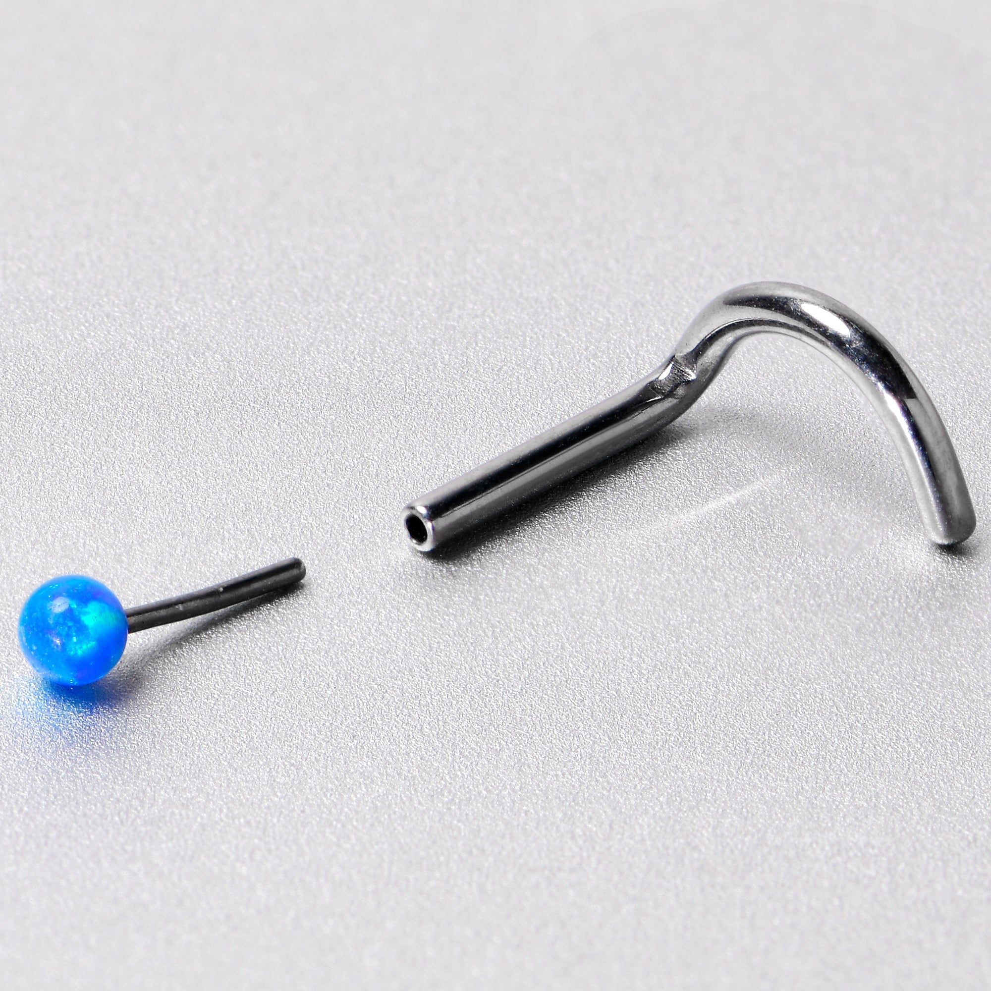 18G 1/4 Blue Synth Opal G23 Titanium Threadless Left Nose Screw