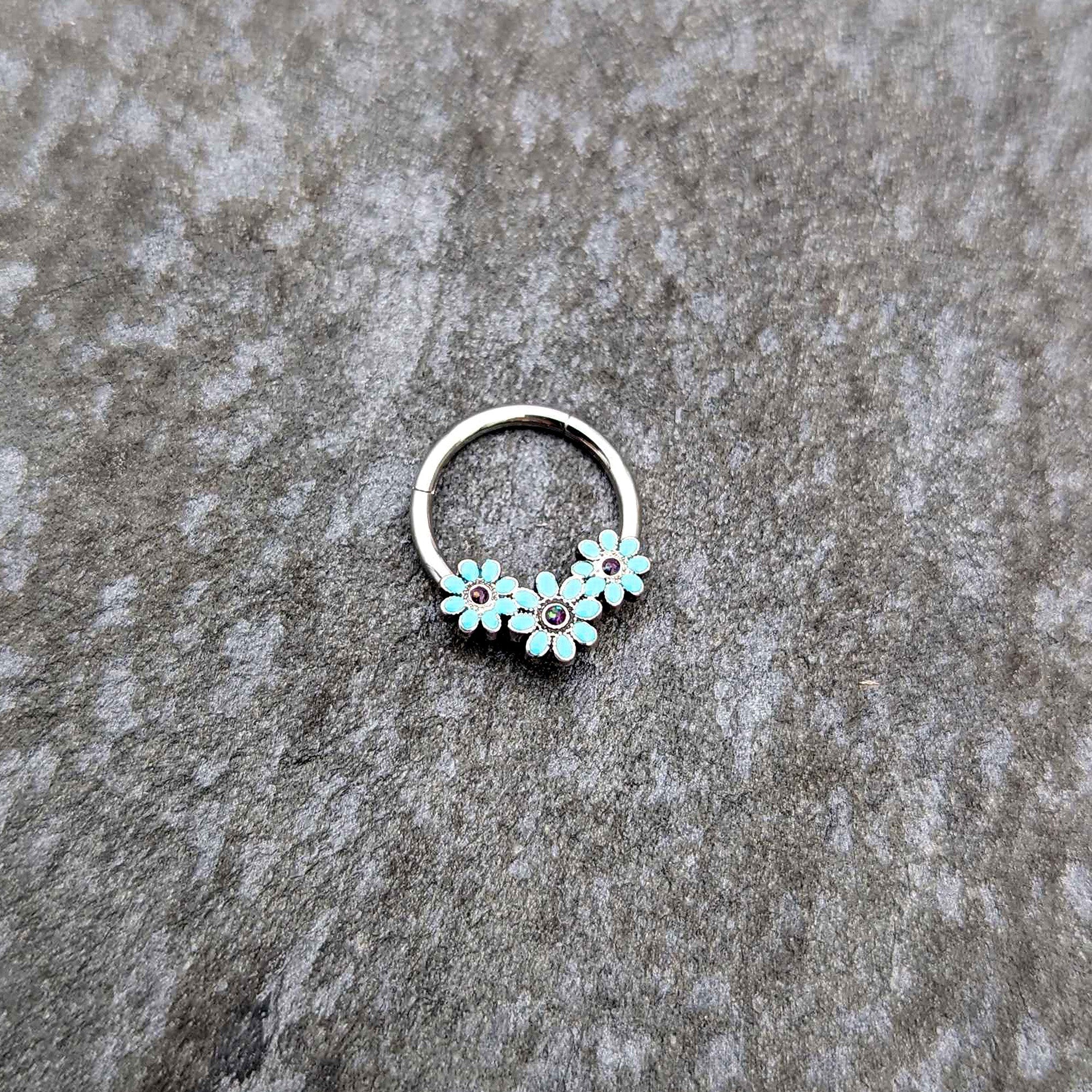 16G 3/8 Blue Gem Flower Trio Teal Petals Hinged Segment Ring