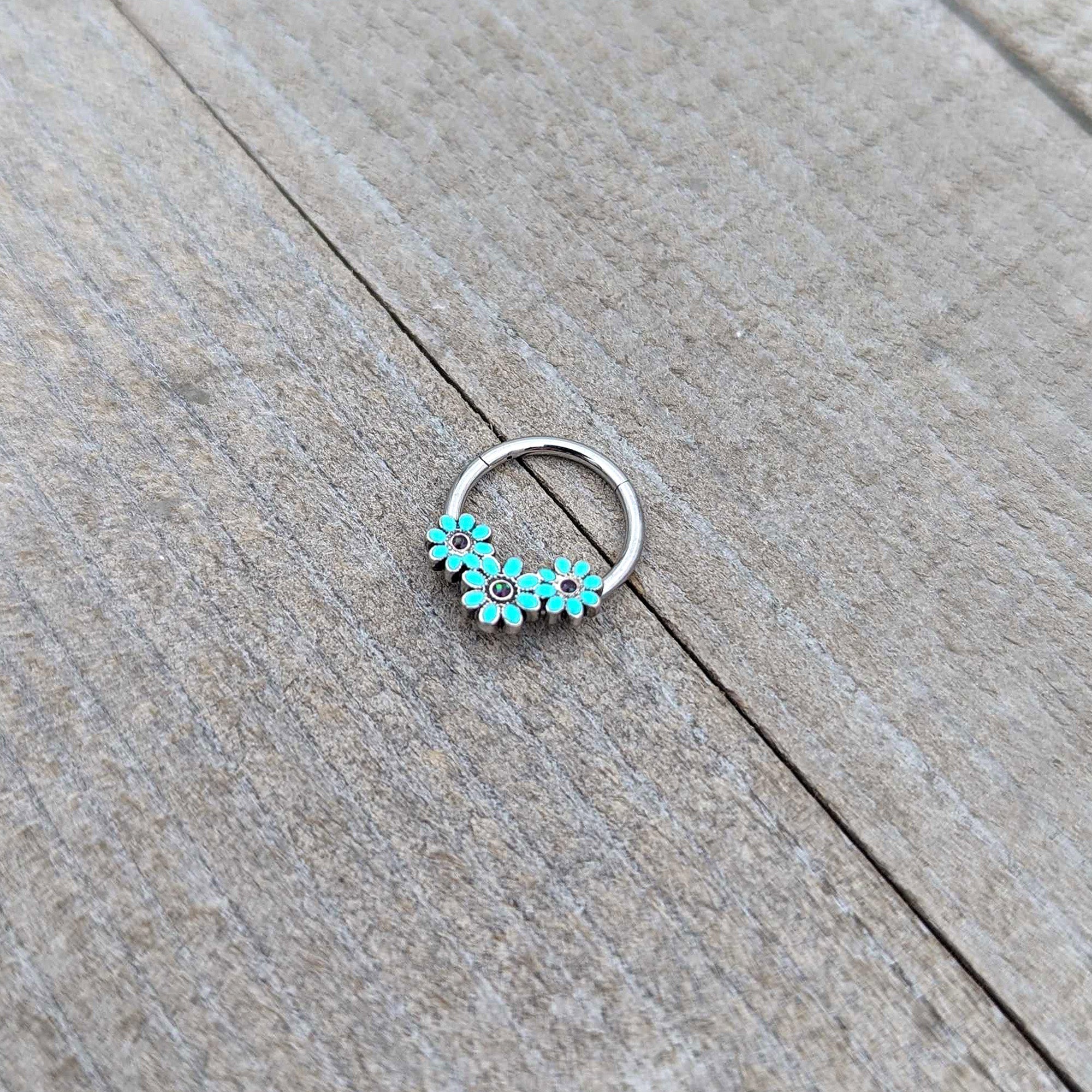 16G 3/8 Blue Gem Flower Trio Teal Petals Hinged Segment Ring