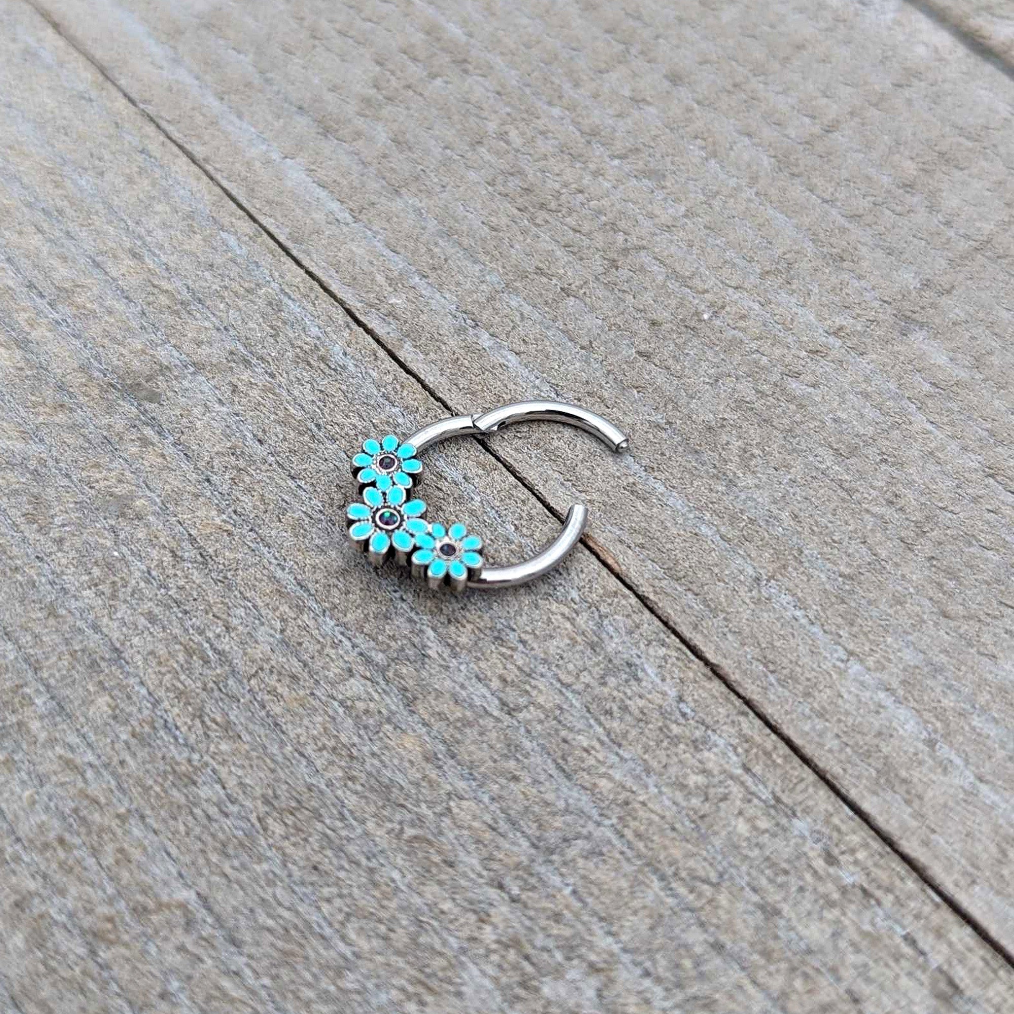 16G 3/8 Blue Gem Flower Trio Teal Petals Hinged Segment Ring