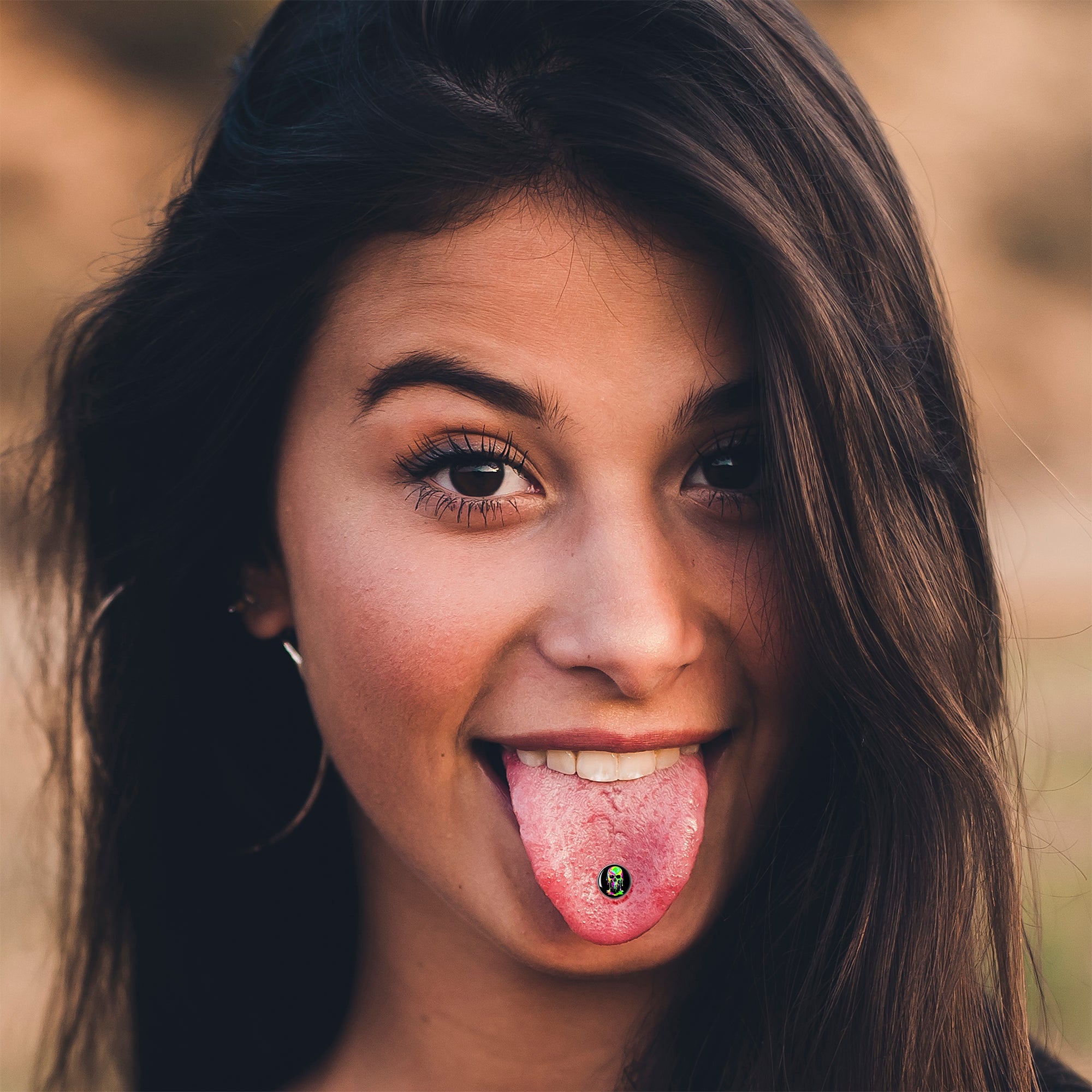 Ultra Bright Melting Skull Barbell Tongue Ring by Onyx O