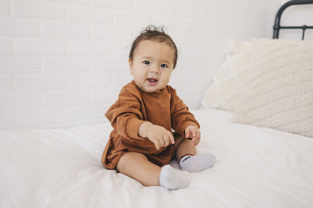 Long-Sleeved Pocket Tee Romper *0-3m left
