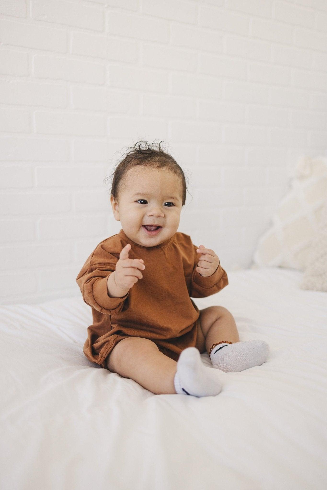 Long-Sleeved Pocket Tee Romper *0-3m left
